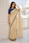 Cream & Navy blue checkered Kerala cotton saree with tassels