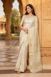classic golden Kasavu Tissue Silk Kerala saree